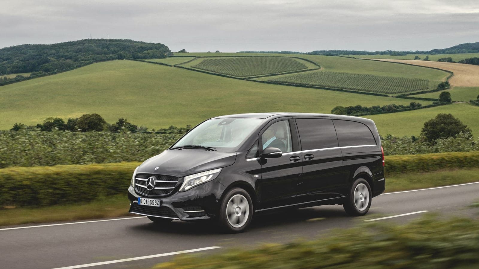 Private Mercedes V-Class driving through the Normandy countryside from Paris towards the D-Day beaches