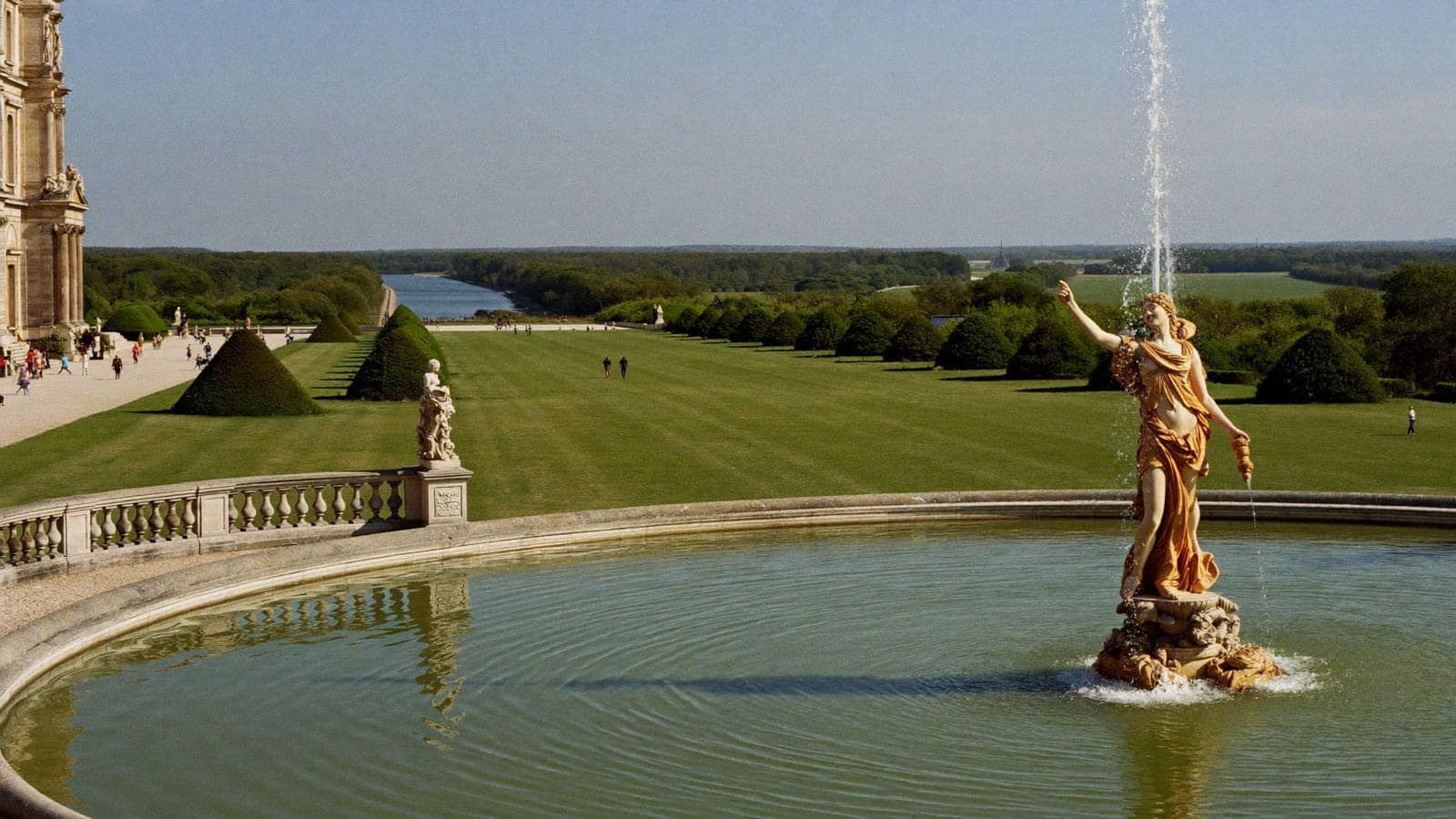 Palace of Versailles gardens fountains families children running Apollo fountain Grand Canal